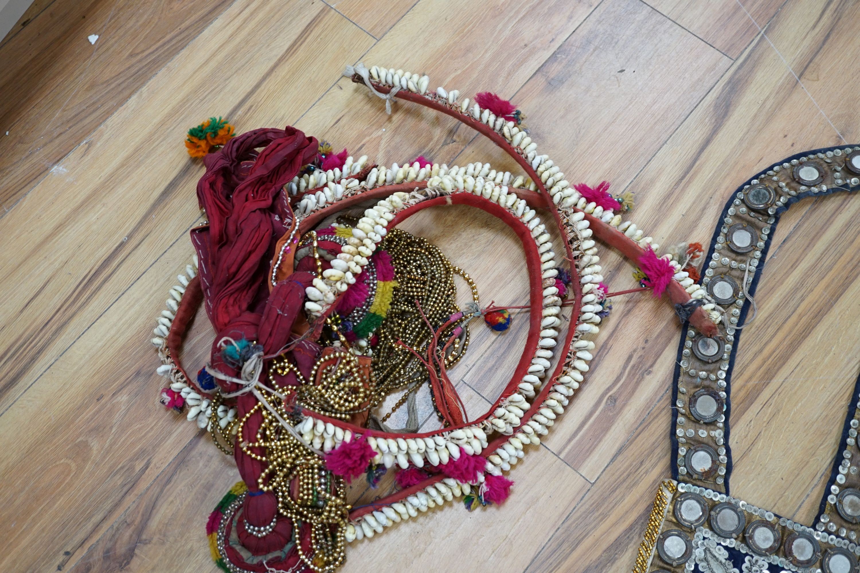 A collection of Indian mirrored panels and decorative shell work